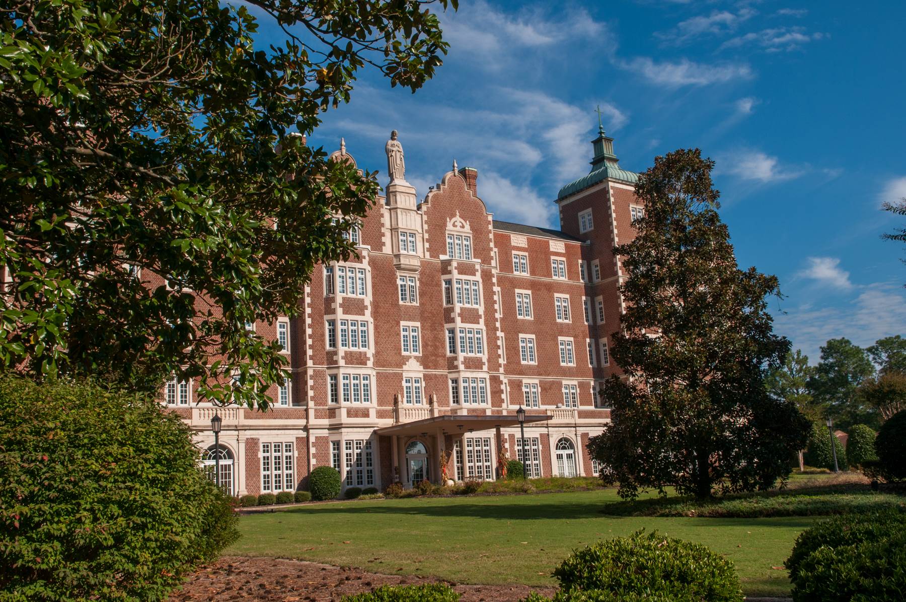 Pine Knoll featuring statue of St. Joseph
