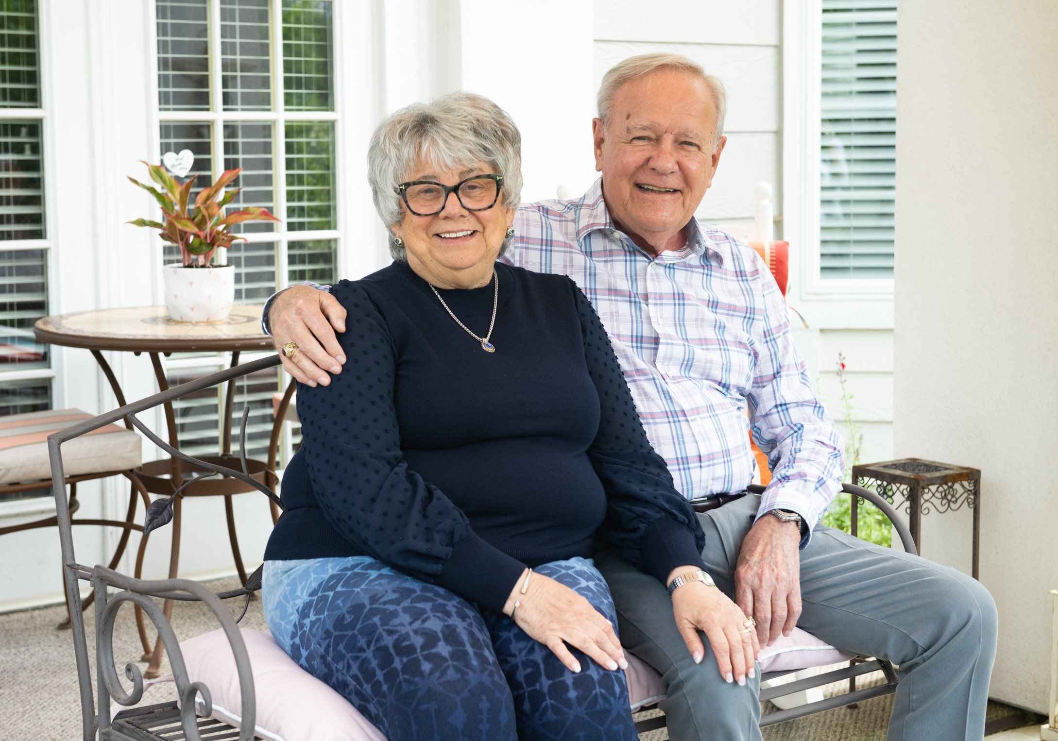 senior couple on porch at St Joseph of the Pines