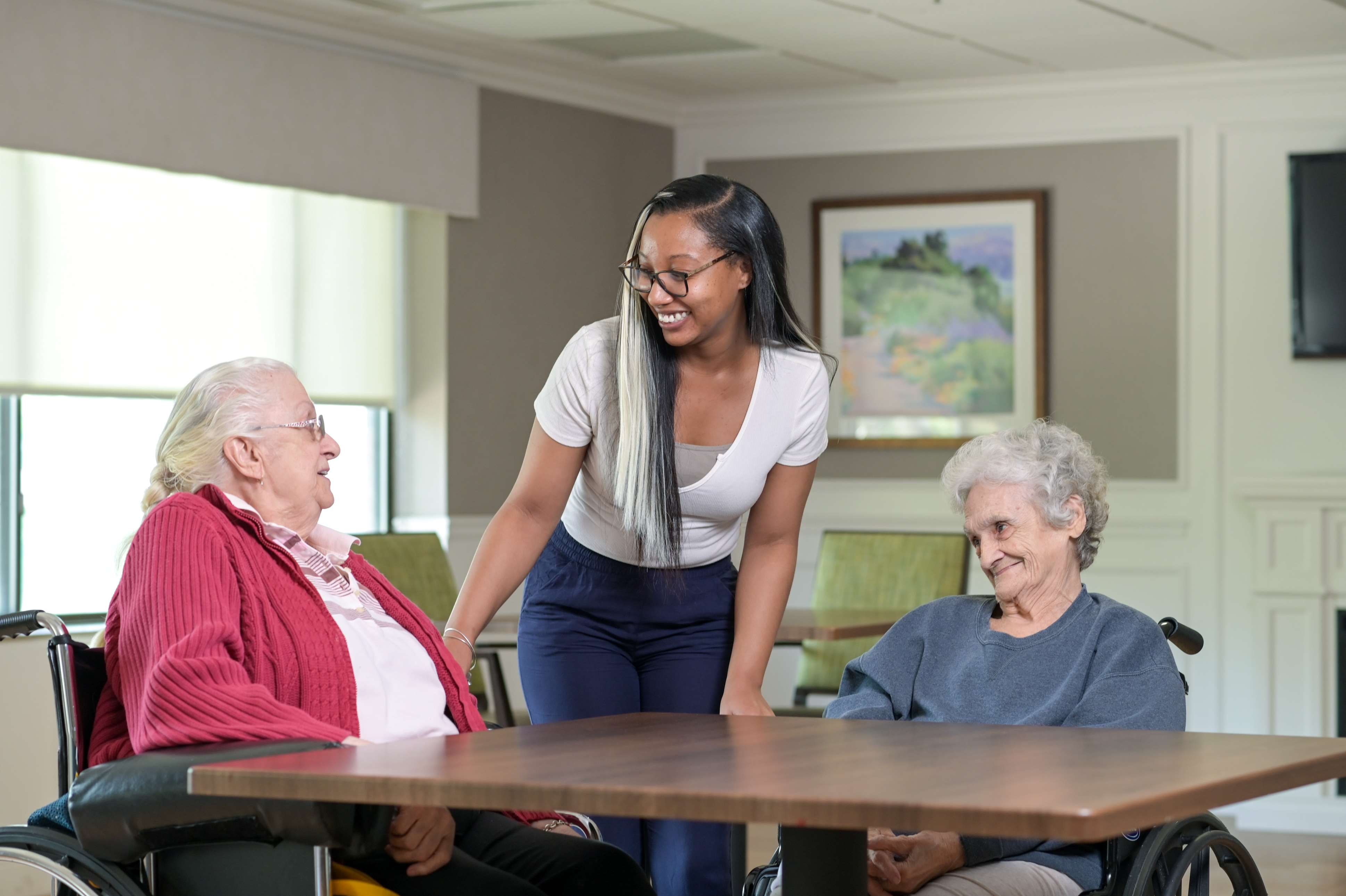 two female residents with colleague